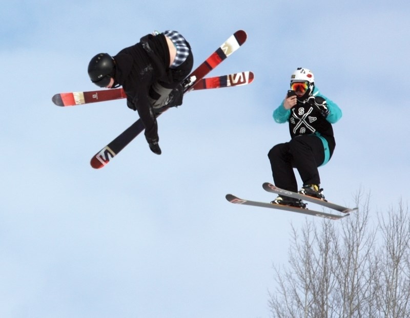 Hundreds of people enjoyed Family Day at the Tawatinaw Valley Ski Hill Feb. 16. Dalton Masur lined up a shot of his brother Daniel getting some air off the big jump.