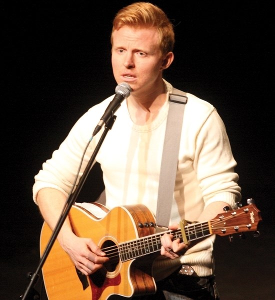 Edmonton-based musician Martin Kerr belts out a song at a Night at the Fringe at CATS Theatre on Friday March 27. Kerr, followed by a performance of the play McCrackin 2: The 