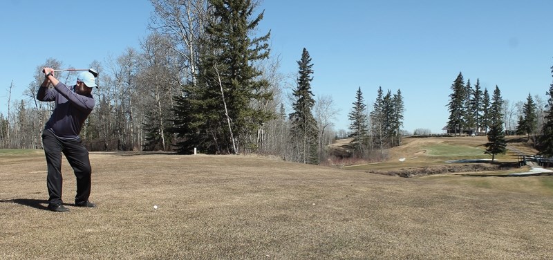 Westlock Golf Course CPGA head pro Kevin Lynes shows perfect form during an early spring round last week. The course opened for the season on Saturday.
