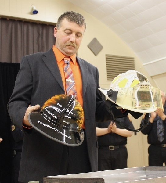 Outgoing Westlock County fire chief John Biro was presented with two helmets as sign of admiration by area fire fighters at Saturday night’s volunteer appreciation night held 
