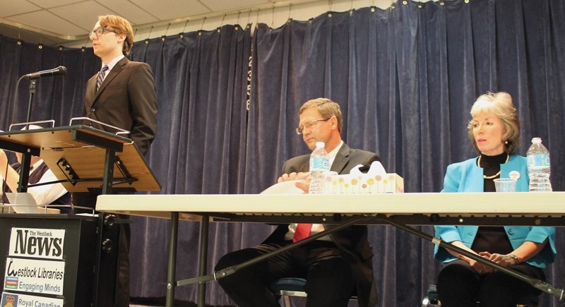 NDP candidate Tristan Turner speaks during the April 22 Westlock election forum held at the Legion. Listening are Wildrose candidate Glenn van Dijken and PC incumbent Maureen 