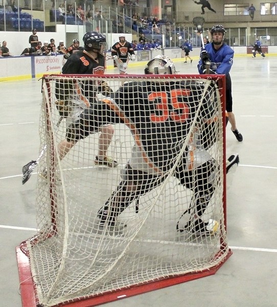 Westlock Rock’s Daneel Lategan waves his wand and casts a spell on the Edmonton Wizards goaltender during his team’s 11-2 win on Friday night at the Spirit Centre. Lategan