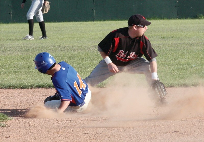 Red Lions’ shortstop Jordan Brand calls for the ball from the outfield to make a play at second base during the Lions home opener at Keller Field on May 13. The Red Lions