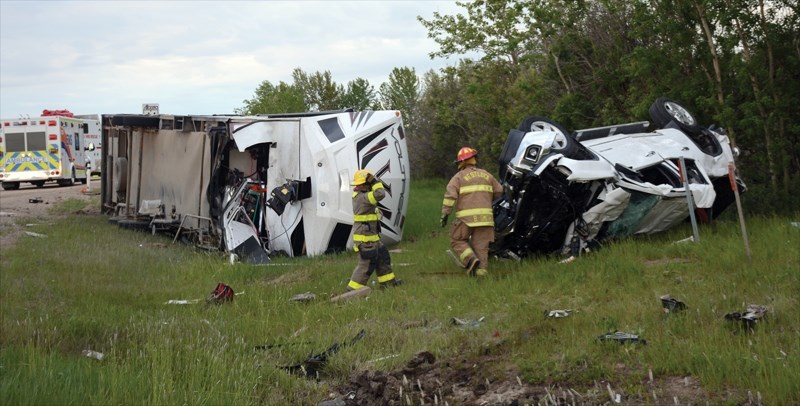 The scene following a May 30 collision between two pickup trucks at the junction of highways 44 and 661. Four people were sent to hospital following the crash.