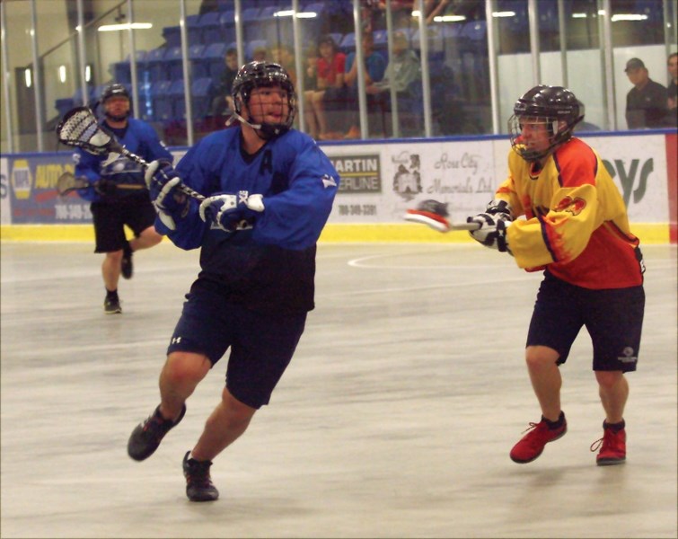 Westlock Rock’s Scott Ivey shoots and scores during a six-goal third period as the Rock defeated the Lakeland Heat 8-6 at the Spirit Centre May 30.