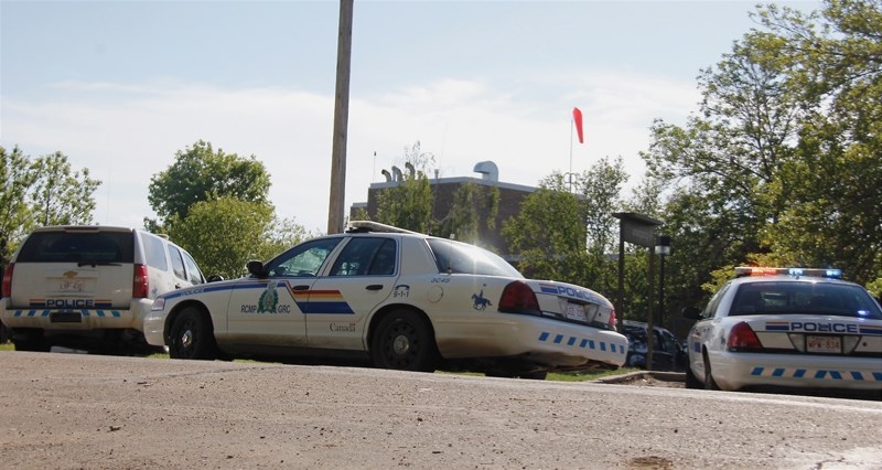 Police cruisers line 48th Street in Barrhead after a June 5 high-speed chase across a number of counties that ended in the arrest of an 18-year-old man. The incident started