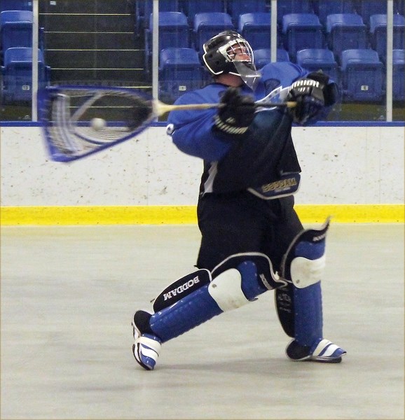 Westlock Rock junior lacrosse goalie Troy Desranleau fires a ball down the floor during the Rock’s 11-7 Sunday afternoon loss to Fort Saskatchewan.