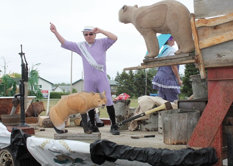 The Busby &#038; District Fish and Game Society took first place in the community&#8217;s centenary celebration parade held June 13 — pictured is society member Don Gibson.