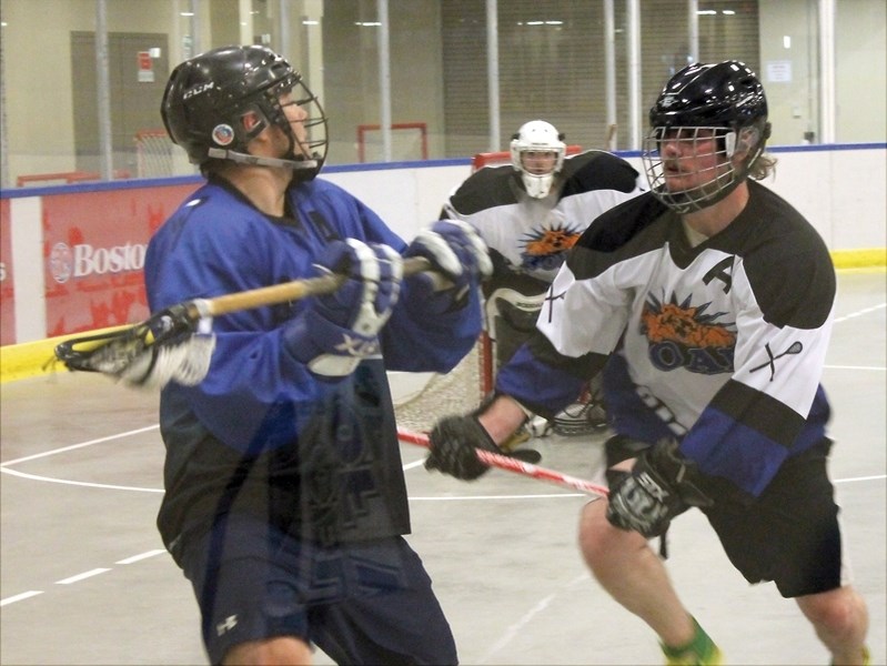 Assistant captain Scott Ivey controls the play during the team&#8217;s six-goal third period. Ivey had three goals and an assist during Sunday&#8217;s 9-6 win over the