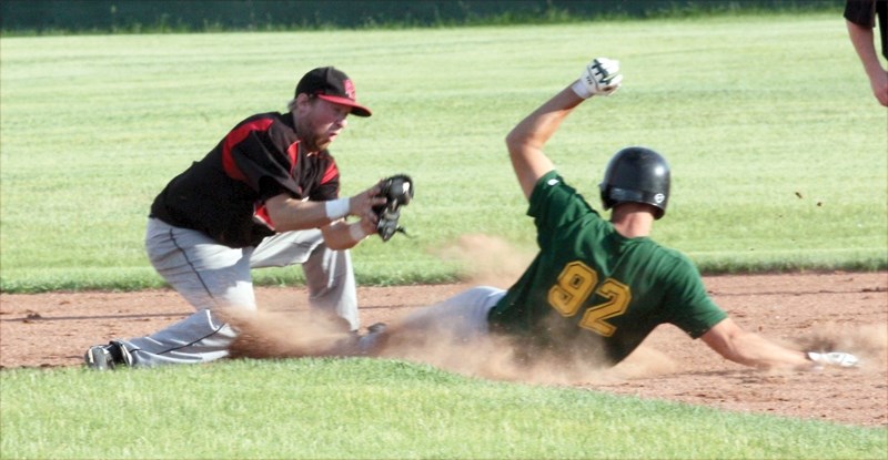 Westlock Red Lions’ second baseman Jordan Brand tags out an Edmonton Blackhawk on a steal attempt during the club’s 3-2 win at Keller Field on July 2.