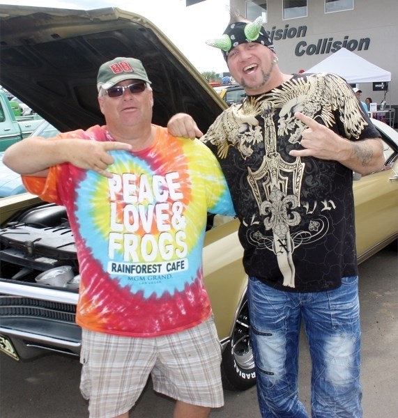 Al Faragini of Spruce Grove poses with Horny Mike of the reality TV series Counting Cars at the Precision Show n&#8217; Shine on July 25.