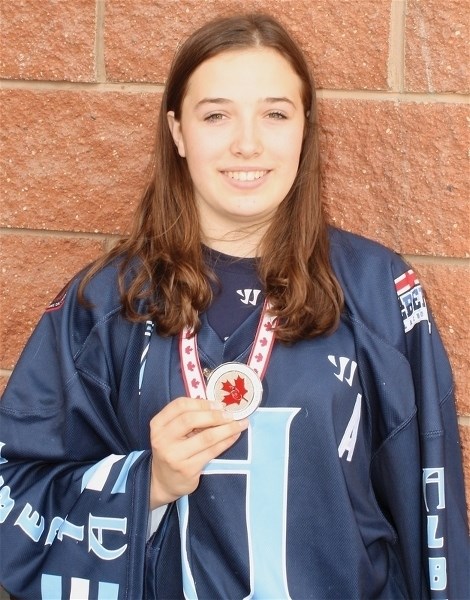Westlock’s Britannie Ouimet displays the silver medal she won playing for Team Alberta at the Female Midget Box Lacrosse Nationals held in Calgary July 21-25.