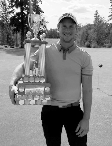 Westlock Men’s Open Championship winner Chase Provencal poses with the Larry Kickham trophy after he won the 54-hole tournament with a total score of 223 strokes. This was