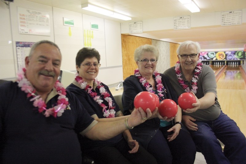 Westlock Bowl owners Don and Susan Cloutier (left) with former owners Carolyn and Garth Kohlsmith gear up for fifth annual Bowl for Cancer that runs Jan. 15-16 and 22.
