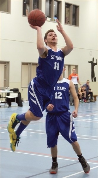 Shark Nick Schwarz sinks a bucket in the club’s 60-55 championship game victory over the St. Francis of Assisi Catholic Academy Falcons at the North Central Zone Ranking