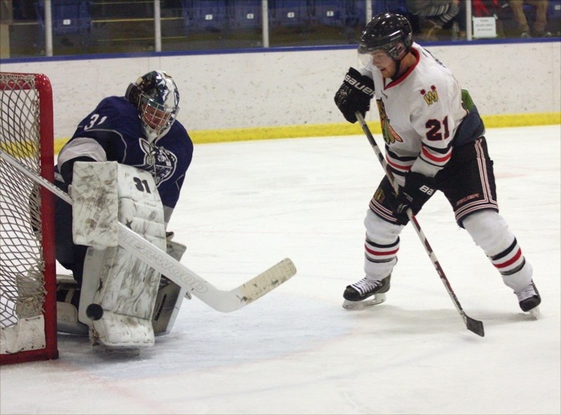 Warriors’ Nathan Brown gets a close-in chance on the Edson Ice goalie during the club’s 8-2 Friday-night win at the Rotary Spirit Centre. The club fell 7-4 to Tofield