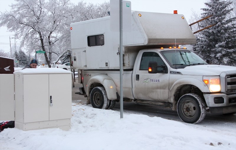 A Telus technician makes adjustments to a Town of Westlock box Jan. 19 in preparation for upcoming $9 million fibre optic upgrades.