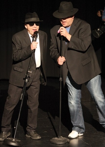 Don Gibson and Bill Workun practice their Blues Brothers routine March 3 in preparation for the upcoming Rock of Ages show at the town’s Cultural Arts Theatre on March 12 at
