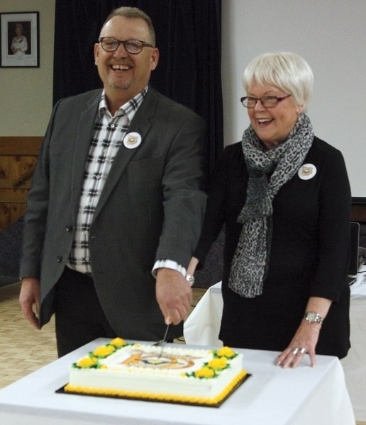 Mayor Ralph Leriger and 100th anniversary committee chair Shirley Morie, who’s also a former mayor of Westlock, cut the town’s 100th birthday cake at the Legion on March 11.