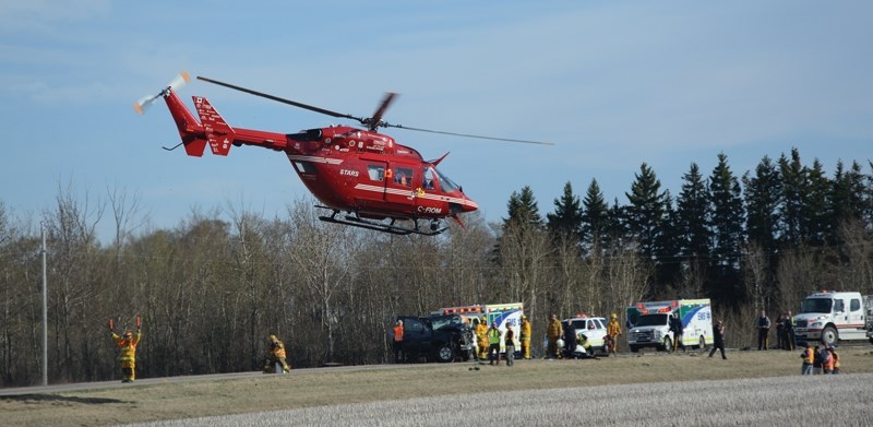 The scene of an April 27. 2015 crash near Vimy on Highway 2 that claimed the lives of an area couple.