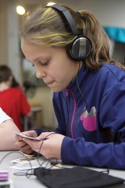 Victoria Brett focuses during the final round of memorization at the Alberta Provincial Memory Championships, held in the Westlock Elementary School Library March 24. Brett
