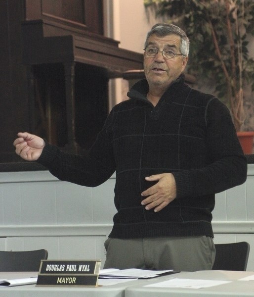Village of Clyde mayor Doug Nyal addresses more than 40 residents that packed Clyde Community Hall April 11 for the viability review meeting.
