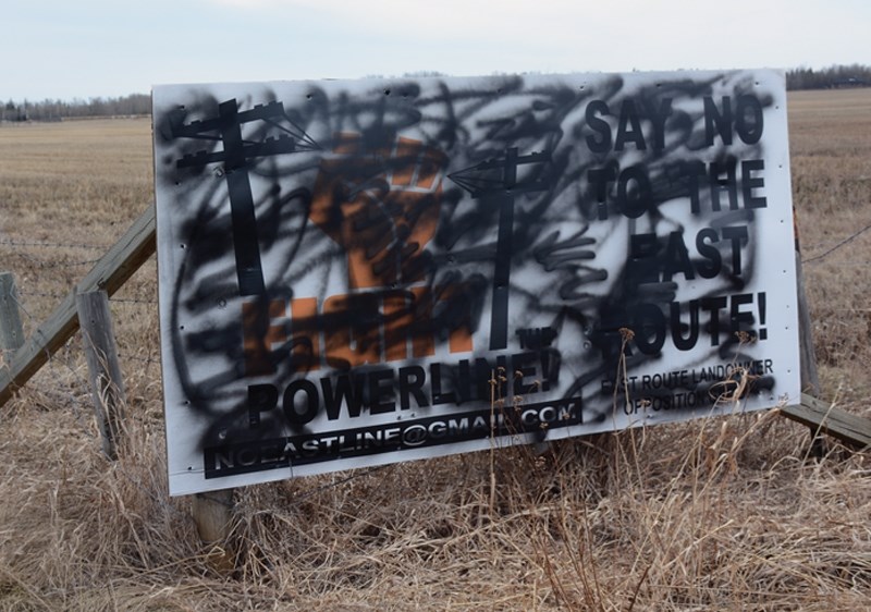 A group of area residents opposing the east route of the proposed Fort McMurray West 500-kV Transmission Project have seen their signs defaced, or removed.