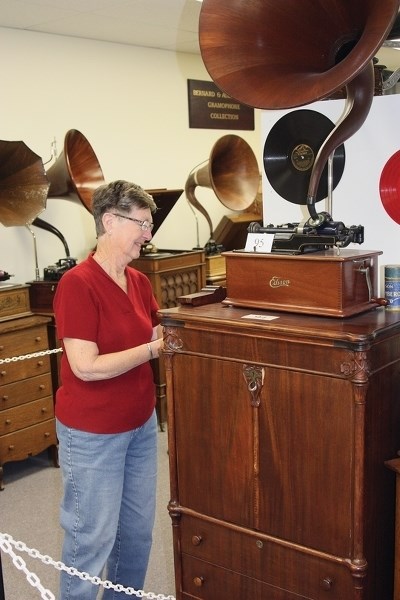 Volunteer June McMillan sweeps up during the Westlock Pioneer Museum’s annual volunteer cleanup May 12. The museum opens on May 23, kicking off a summer of entertainment and