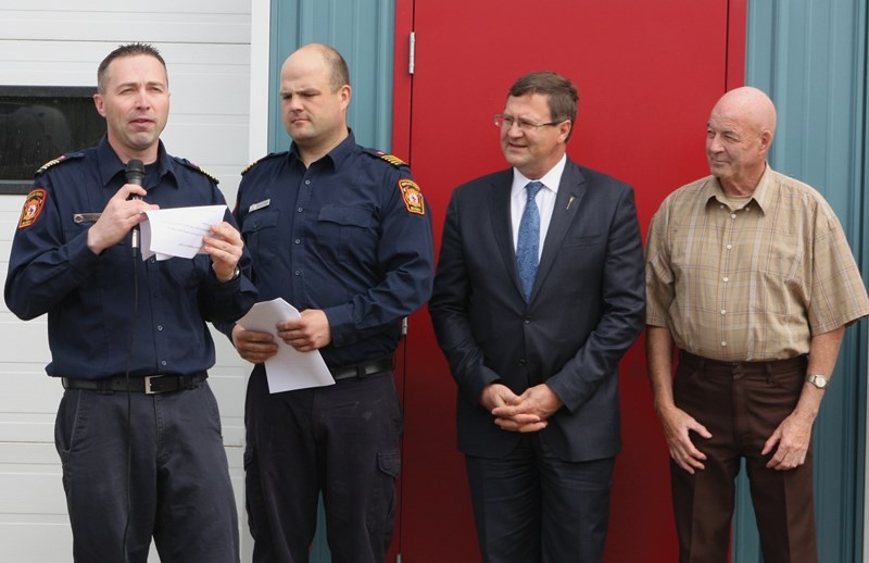 A grand opening ceremony on Saturday, May 28 officially opened the new Busby fire hall, which members fundraised for and built themselves. L-R: Busby fire chief Jared