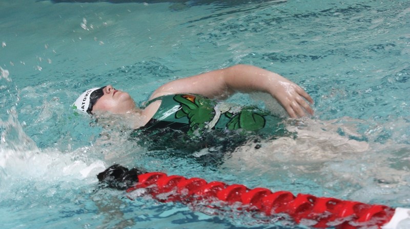 Westlock Gators swimmer Paige Pirnak swims in the girls 50-metre backstroke during the club’s June 4 home meet.