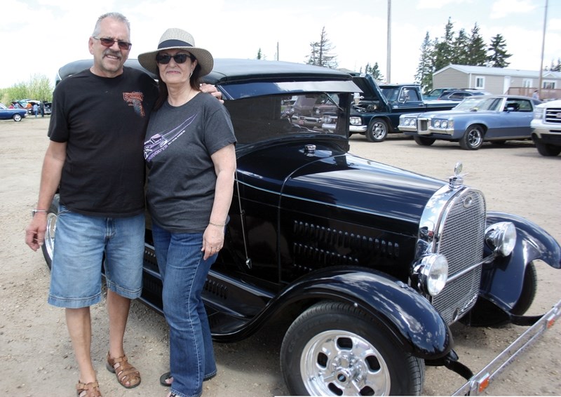 Brian and Lorraine Allison pose with their &#8217;29 Ford Model &#8216;A&#8217; at Busby&#8217;s first Move Over Alberta Show and Shine held June 4. More than 90 vintage cars 