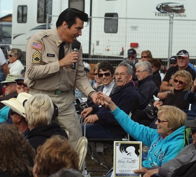 Elvis will be back in the building later this month during the eighth annual Blue Suede Festival in Busby Aug. 19-21. More than 16 Elvis tribute artists are on the bill,