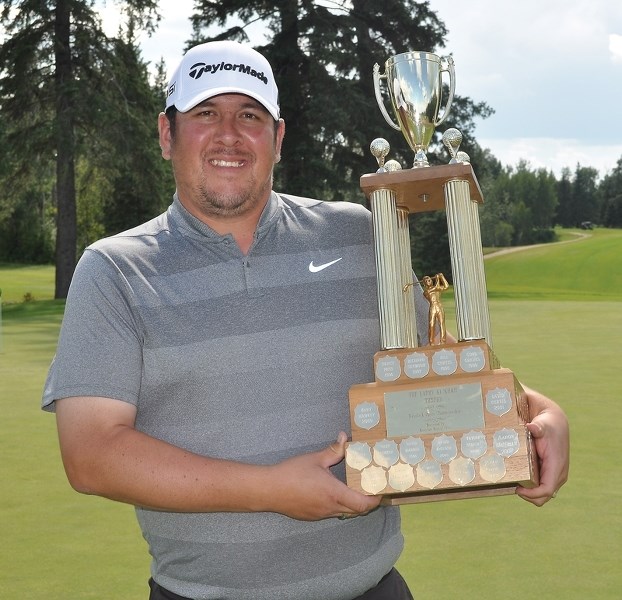Westlock Men’s Open champion Joldy Laliberte poses for a photo after claiming the tournament title at the Westlock Golf Course on Monday, Aug. 1.