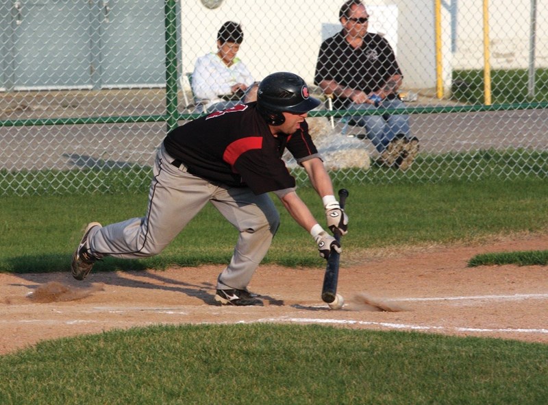 Westlock Red Lions’ Jordan Brand lays down a bunt during a 6-0 win over the St. Albert Cardinals at Keller Field on Tuesday, Aug. 9. The Lions will now face the Edmonton
