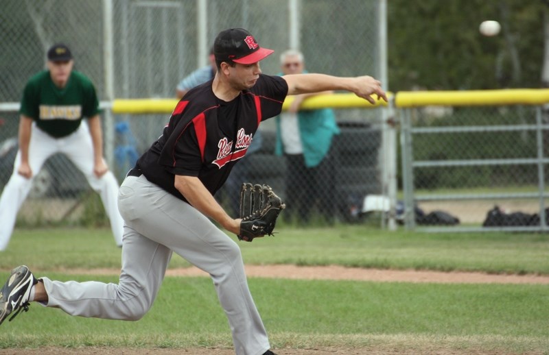 Red Lion Curtis Burlet throws a fastball during the club’s 2-1 10th inning loss to the Edmonton Blackhawks in Game 1 of their best-of-three NCABL semifinal series at Keller