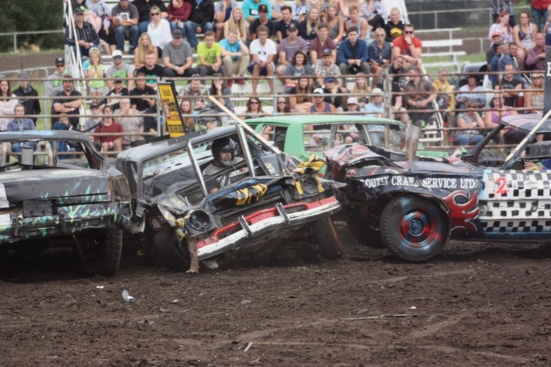 Allen Lalonde (centre) won the Aug. 21 ag fair demolition derby. Dylan Boutin finished second while Monica Bushaw ended up in third place.