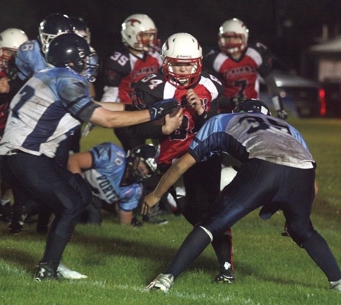 Mathew LeBeau smashes into Vegreville’s defensive line during the T-Birds’ 39-19 Sept. 2 home-opening win.