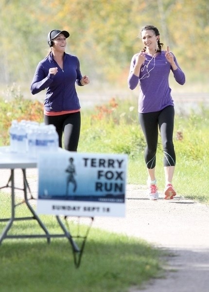 Madison McVeety (left) and Katelyn Provencal lead the pack during the Town of Westlock’s Terry Fox Run on the Rotary Trail Sept. 17. Nearly 25 runners participated in the