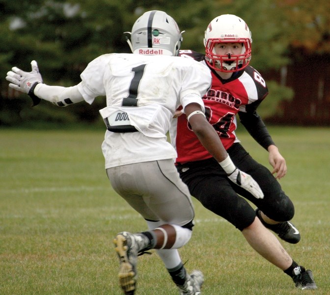 Westlock Thunderbirds player Mathew LeBeau tries to dodge around an opposing Holy Rosary Raider during Friday’s home game. The T-Birds came out strong but were blanked 35-0