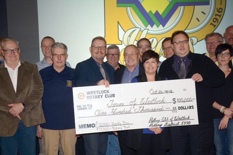 Westlock Rotarians pose with the $100,000 cheque presented at the Oct. 26 Mayor’s Breakfast. L-R: Don Scott, Randy Wold, Dennis Bichel, Town of Westlock mayor Ralph Leriger,