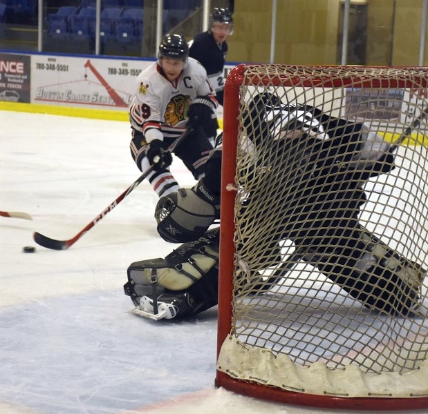 Senior Warriors captain Mike Ivey heads to the net during the club&#8217;s Oct. 29 4-2 home loss to the Eckville Eagles. The team&#8217;s Sunday afternoon game versus the