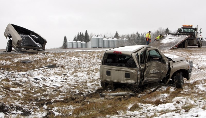 An Edmonton woman is dead following a two-vehicle crash on Highway 44 near Alcomdale Nov. 1. Traffic was restricted until the afternoon as crews worked to clear the wreckage.