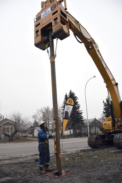 The corner of 99 Avenue and 100 Street was bustling with installation of new geothermal technology using helical screw-in metal pilings to heat new affordable seniors housing 