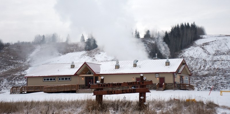 Snow billows around the Pine Valley Ski Resort in Tawatinaw Dec. 10 as snow-making equipment and graters prepare the hill for the 2017 ski sea-son.