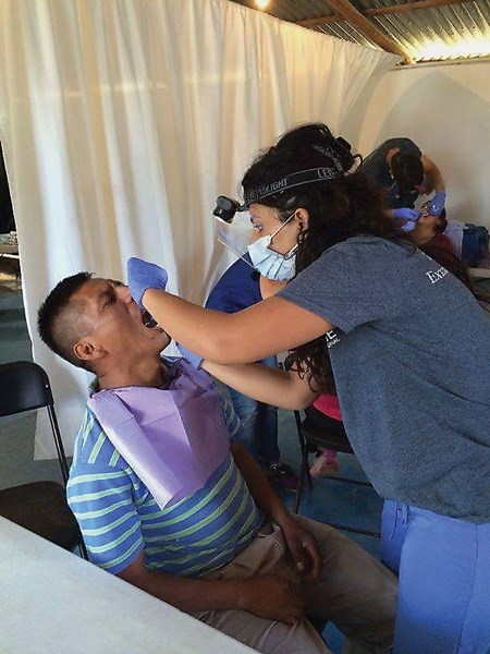 Dr. Shideh Pejman helps out patients during a trip she took to Mexico. Pejman recently left to Afghanistan to help provide dental work for orphans and other persons in need