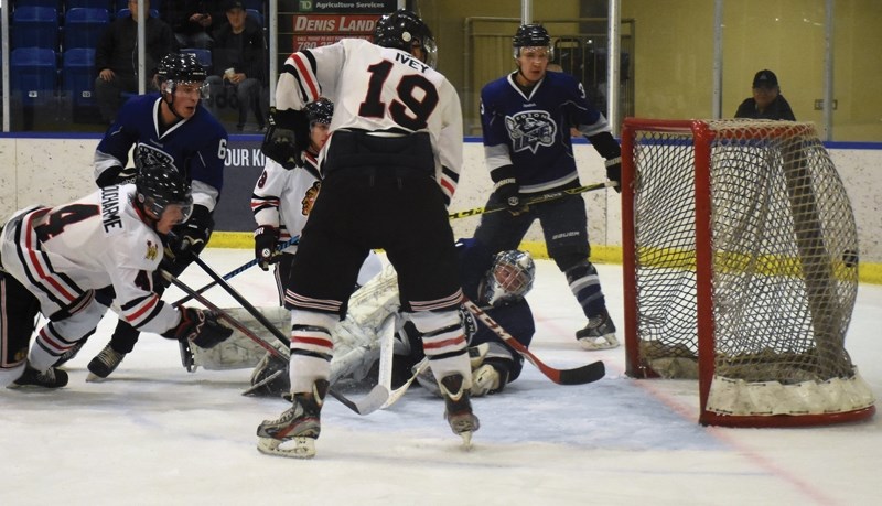 Brady Ducharme (far left) takes a dive as he nails the Senior