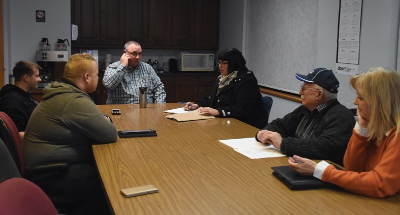 Members of the police consultation committee gather at the Westlock RCMP Detachment Jan. 18 to discuss policing issues and solutions. Clock-wise from top right: Kelly Patry,