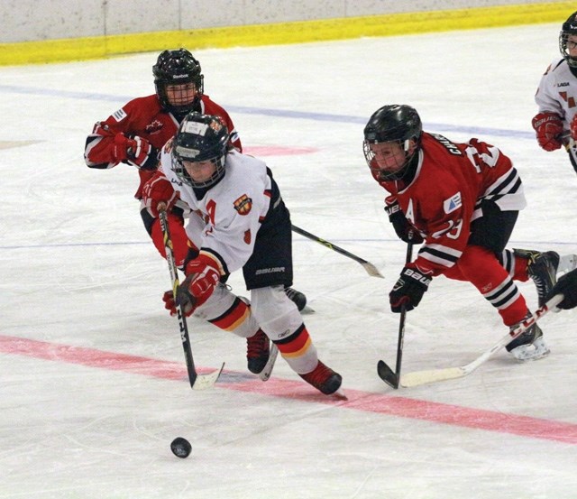 The Westlock Warriors Steve Andrusiak blasts ahead of a few Whitecourt Wolverines during the second game of the Hockey Alberta Zone 3 provincial tournament Jan. 30 at the