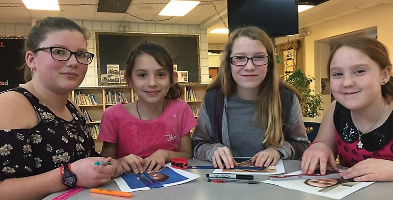 In this photo supplied by Pembina Hills Public Schools, Eleanor Hall School students (L-R) Brieanna Nyal, Haley Ford, Madison Shank and Mac-Kenzie Hein analyze the shape of