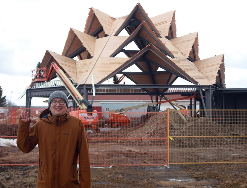 Westlock Meditation Centre caretaker Peter Trang, a.k.a. Thay Duc Tang, stands in front of a new Lotus Pagoda under construction at the retreat April 7. The pagoda is part of 